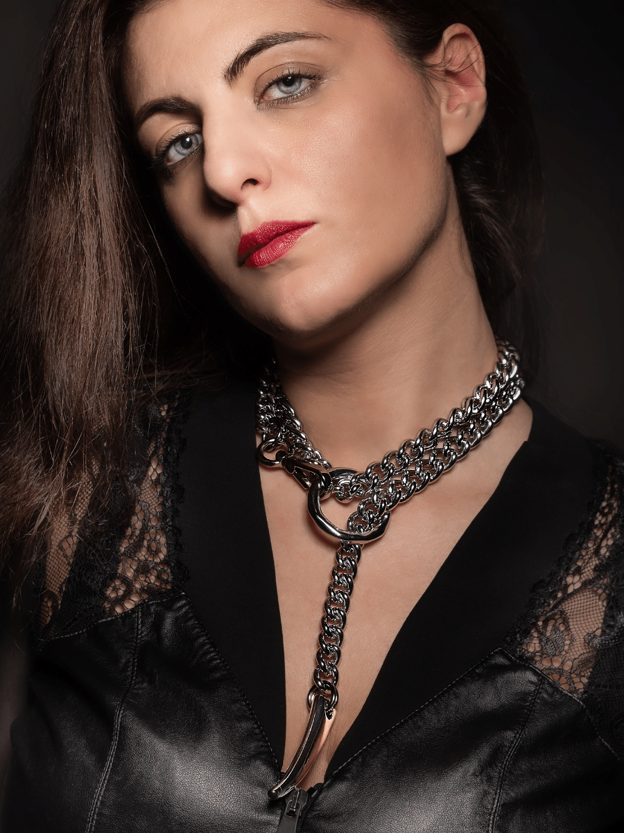 Long y maxi chain necklace in silver color wrapping around the neck, gothic style