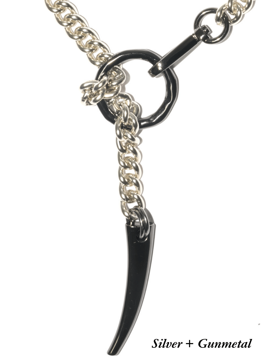 Detail of silver and black chain necklace