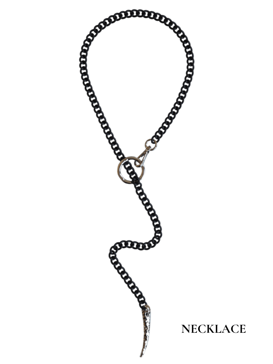 Black chain necklace with a unique pendant on a white background