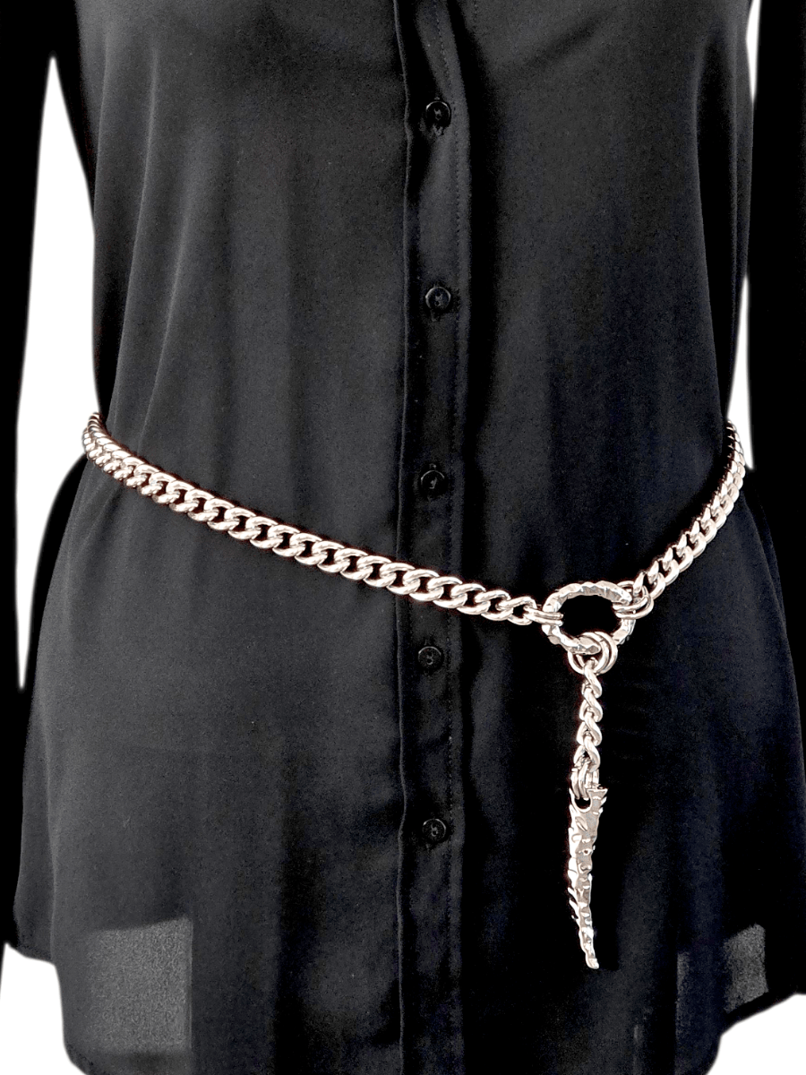 silver chain belt with hammered O ring and claw pendant on waist