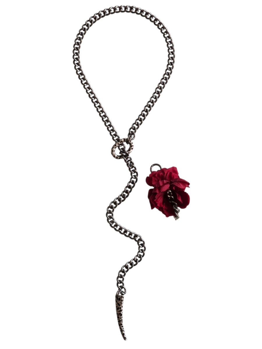 long chain necklace with leopard effect hammered ring and spike and detachable flower pendant