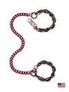Two chain cuffs with leash connnector purple and gunmetal on a white background with Us flag