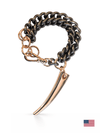chunky bracelet with fag pendant in gunmetal rose gold on white background