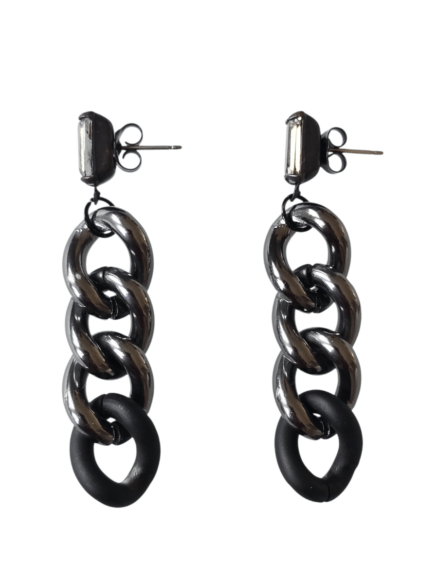 statement black chain earrings on white background