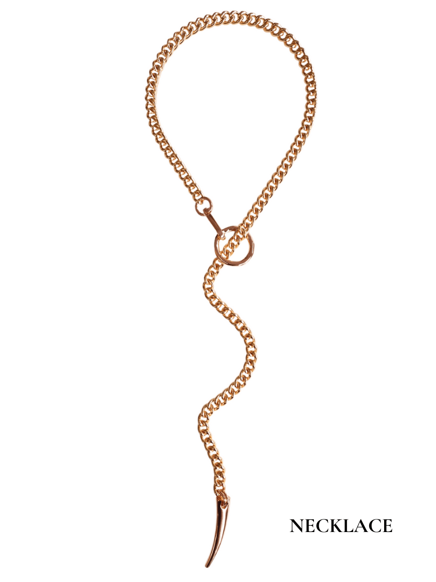Rose gold necklace with a unique design on a white background