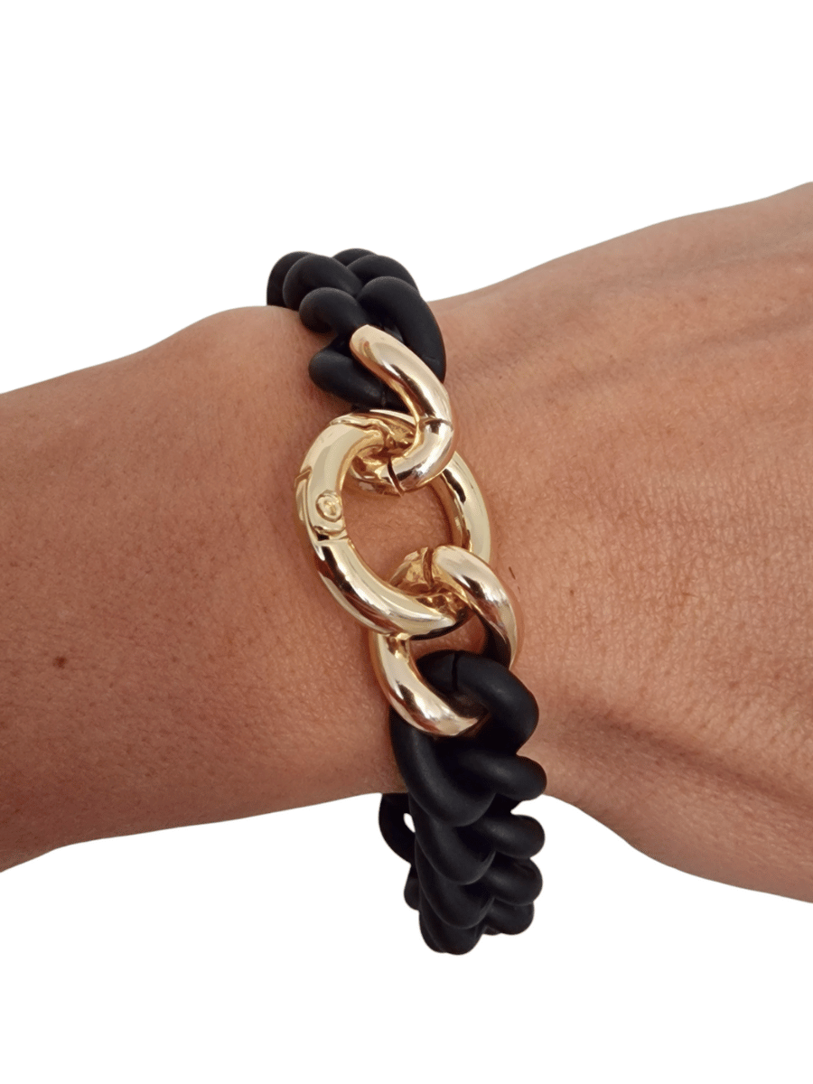 black chain bracelet with gold snap hook on wrist