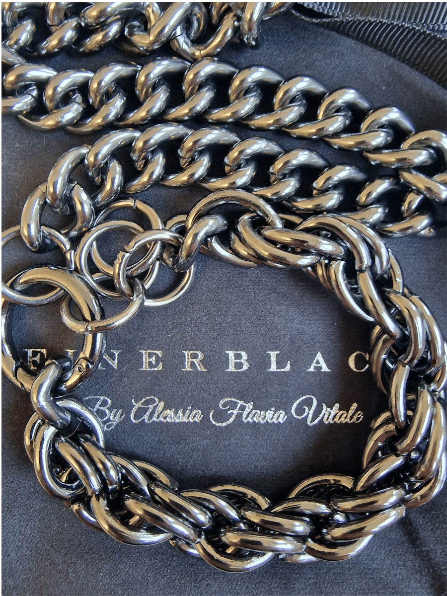 detail of chain bracelet made with rolled rope chain