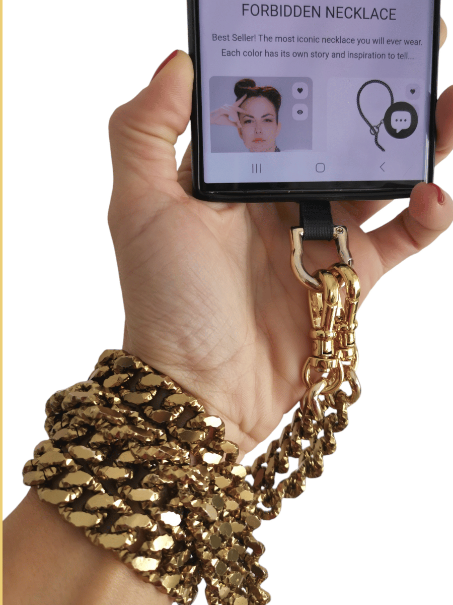 phone chain strap bronze on wrist