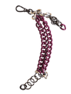 Purple chain bracelet with metal clasp on a white background